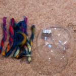 Bauble with cut lengths of wool