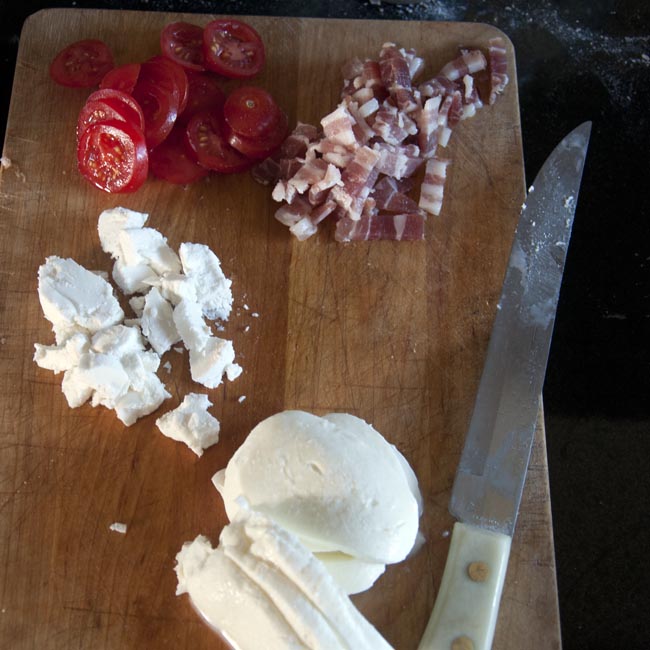 Pizza toppings, ready to go.