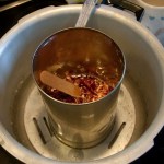 Melted wax with about half the shavings added