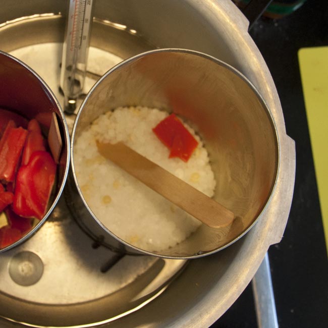 Wax beads with stirrer and dye