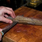 Starting to cut the fillet