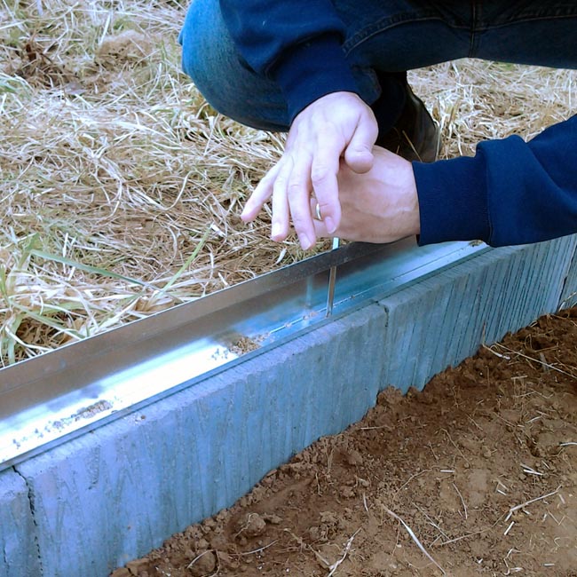 Fixing the base down onto the blocks