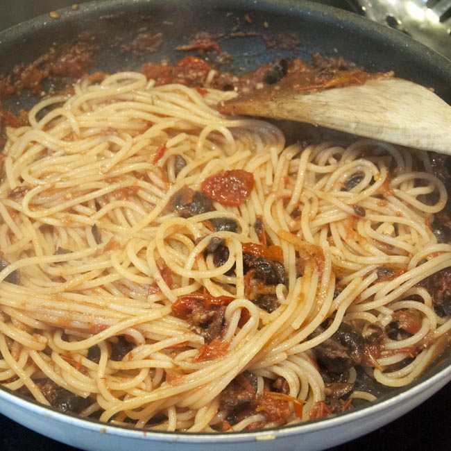 Mix pasta with sauce