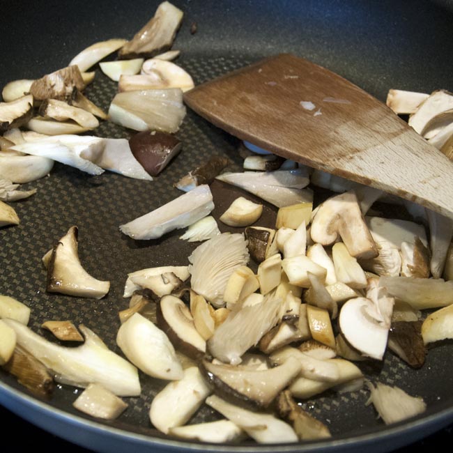 Saute sliced mushrooms