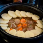 Arrange sliced potatoes