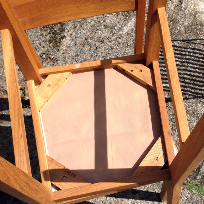 Finally, fix seat pads back in position with screws