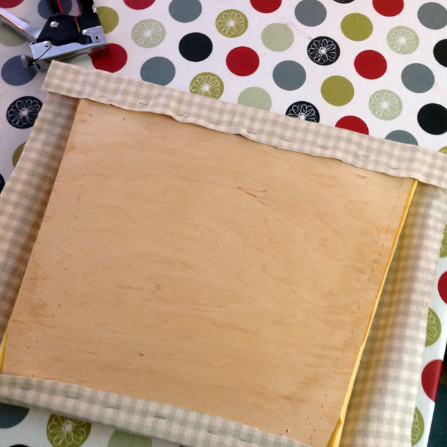 Wrap over fabric snugly and fix opposite edge