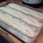 Slash the risen loaves along their length